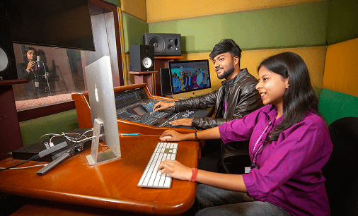 Students in a media production studio